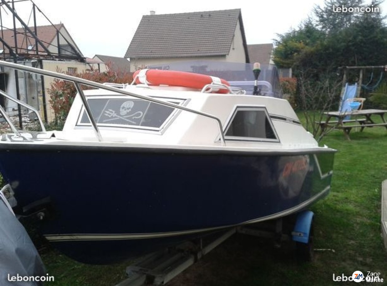 Bateau +moteur + remorque