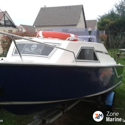 Bateau +moteur + remorque